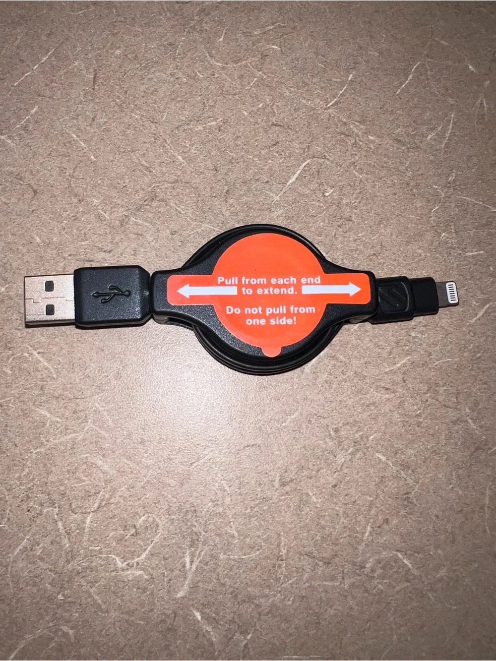 Retractable iPhone Lightning Charging Cable - Scosche